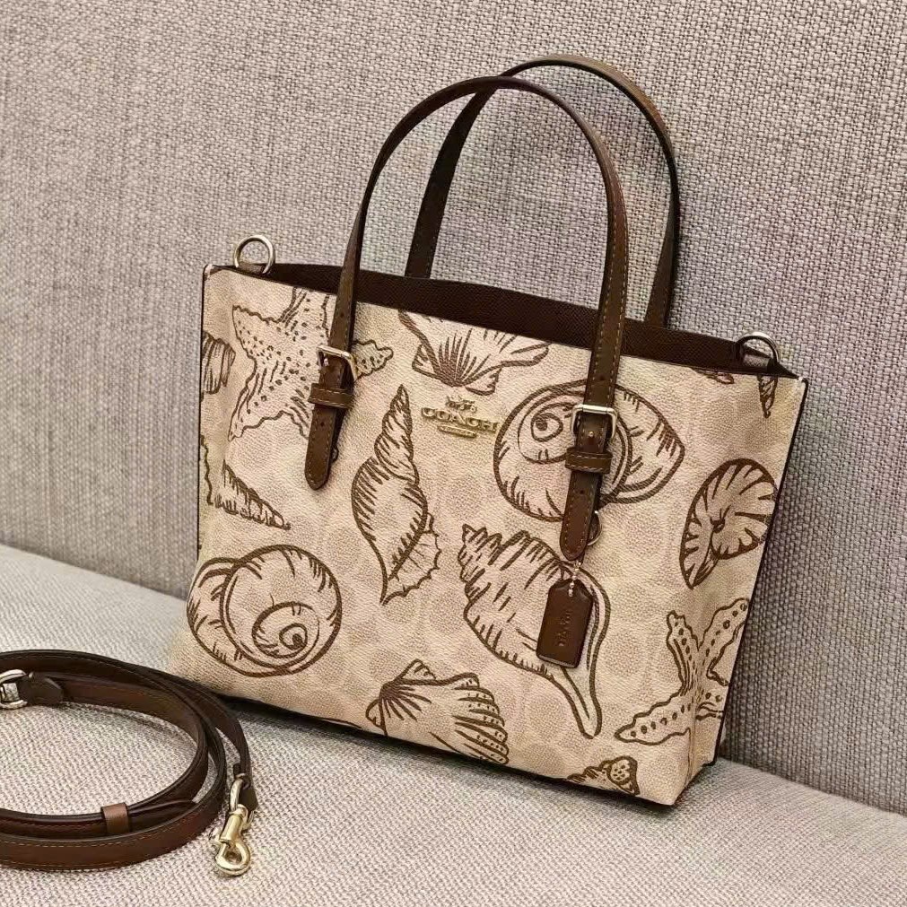 Túi đeo chéo Coach nữ Mollie Tote Bag 25 In Signature Canvas With Shell Print CBH63 2