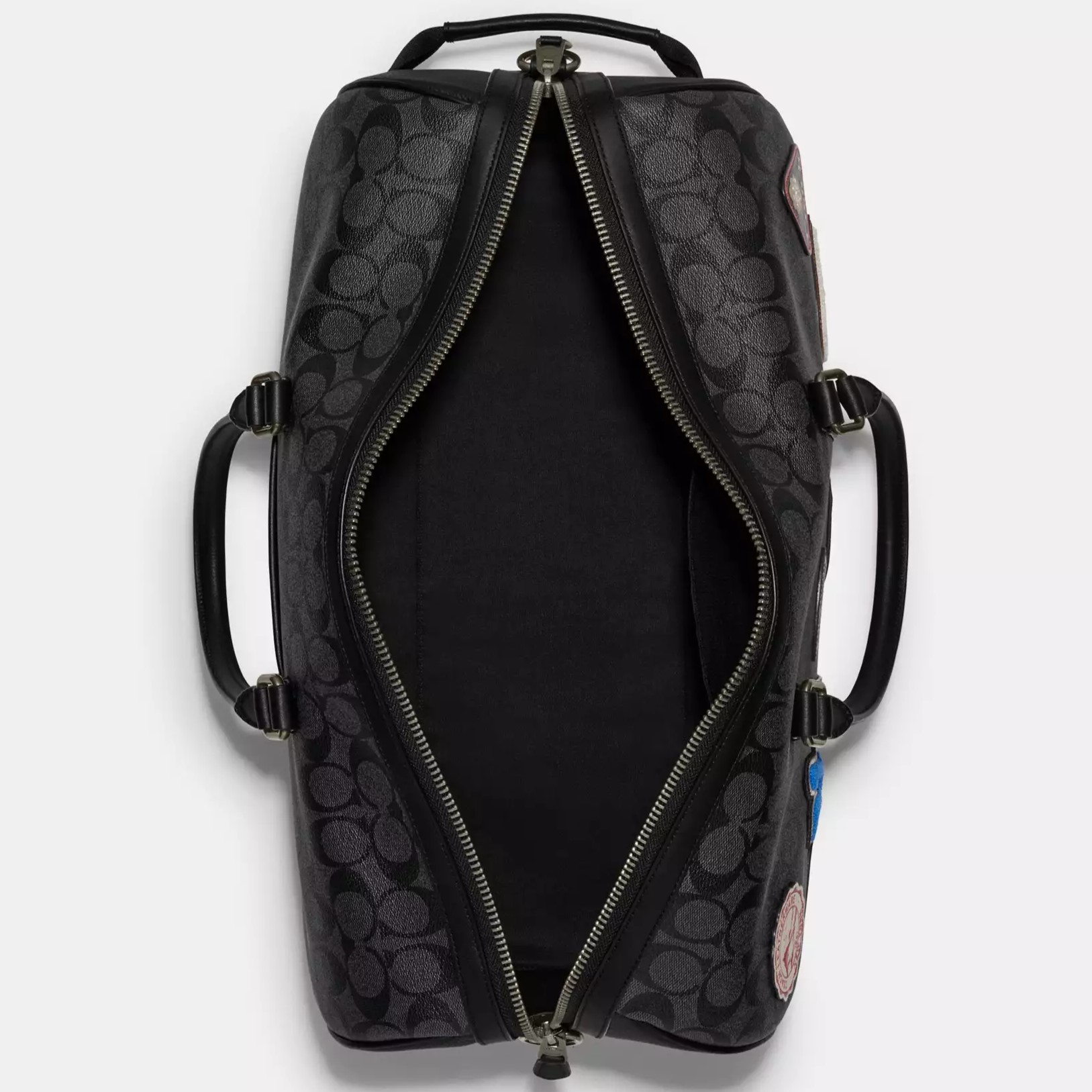 TÚI XÁCH ĐEO CHÉO DU LỊCH COACH VENTURER BAG IN SIGNATURE CANVAS WITH SKI PATCHES CE553 1