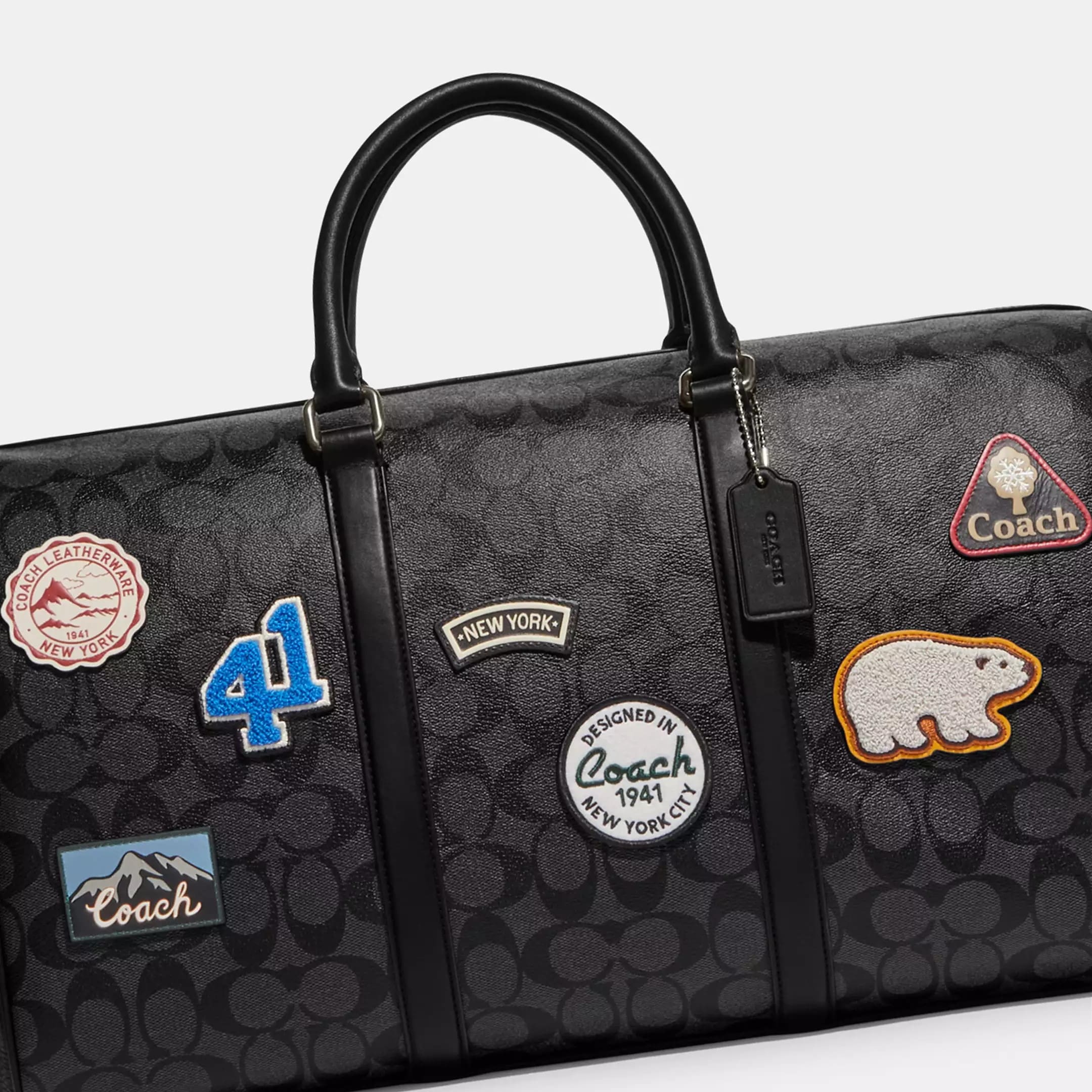 TÚI XÁCH ĐEO CHÉO DU LỊCH COACH VENTURER BAG IN SIGNATURE CANVAS WITH SKI PATCHES CE553 2