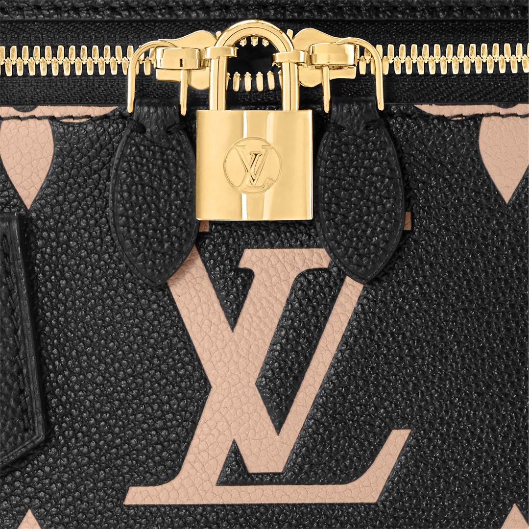 Túi đeo chéo nữ Louis Vuitton Vanity PM In Monogram Empreinte Leather