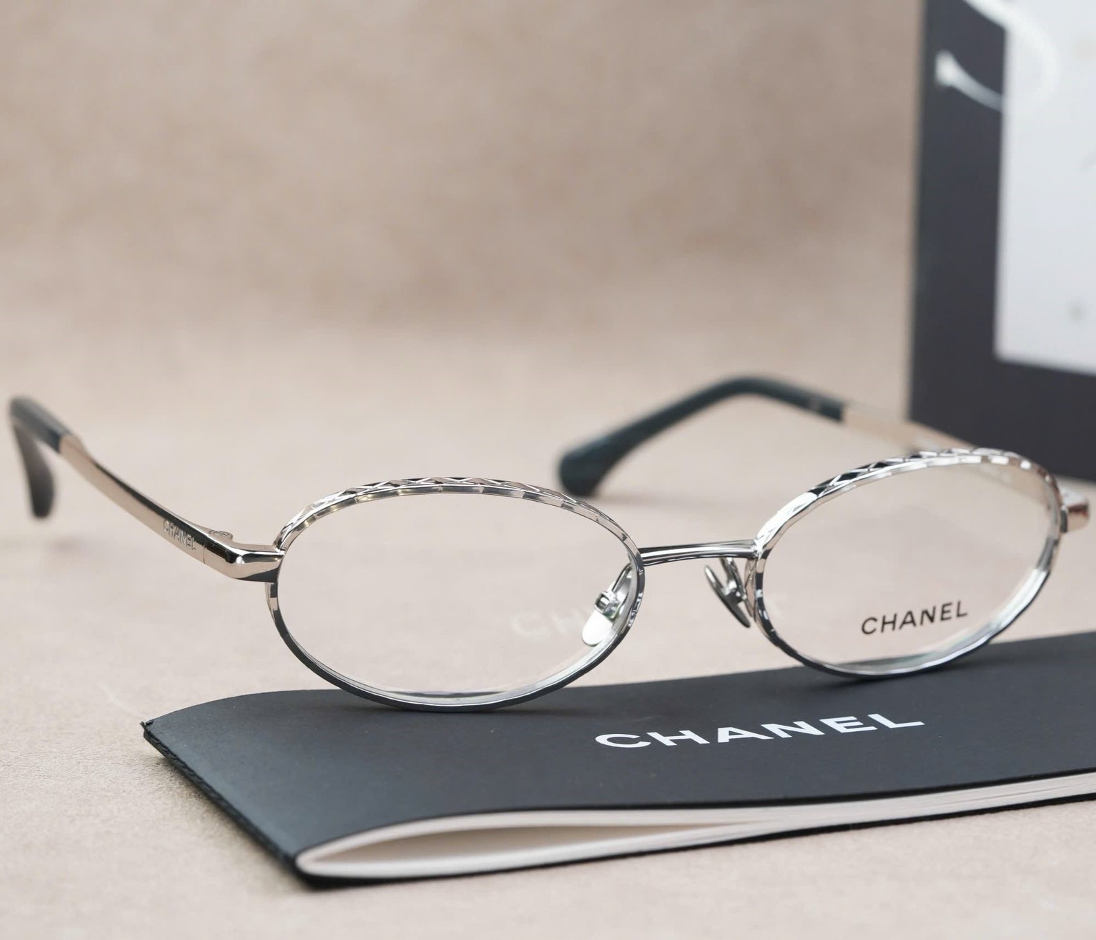 Kính mát gọng kim loại Chanel Oval Silver Frame Eyeglasses 10