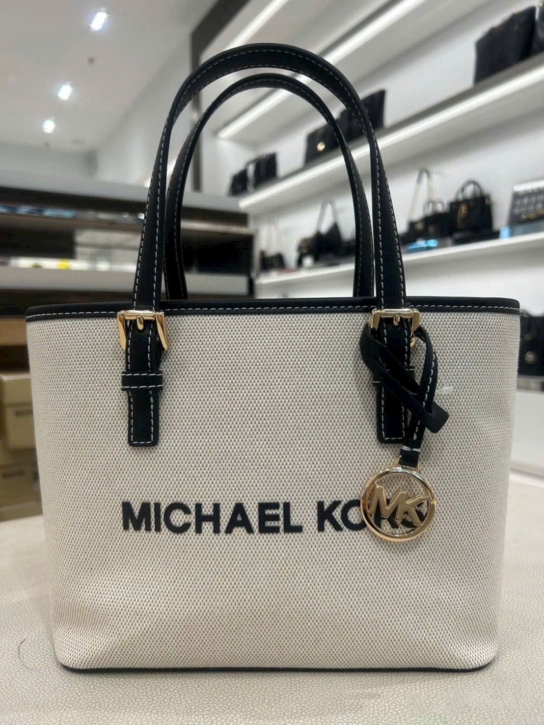 Túi đeo chéo Michael Kors Mini tout-bag Jet Set Travel from the canvas Black 3
