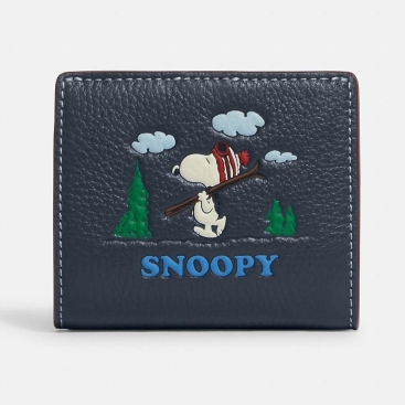 Ví nữ cầm tay limited Coach X Peanuts Snap Wallet With Snoopy Ski Motif