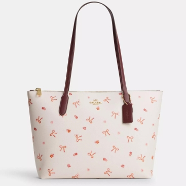 Túi xách họa tiết limited Coach nữ Zip Top Tote With Bow Print Coated Canvas and Smooth Leather CN627