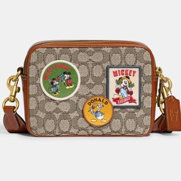 Túi đeo chéo limited Disney X Coach Flight Bag 19 In Signature Textile Jacquard With Pathes CG968
